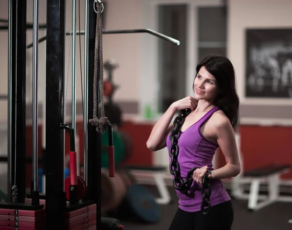 Successful business woman on the background of a modern gym — Stock Photo, Image