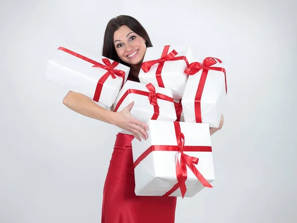 Happy beautiful woman with many gifts .isolated on a white background. — Stock Photo, Image