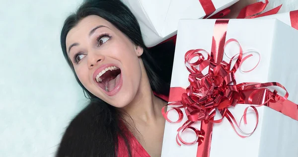 Closeup. enthusiastic beautiful woman with her gift. — Stock Photo, Image