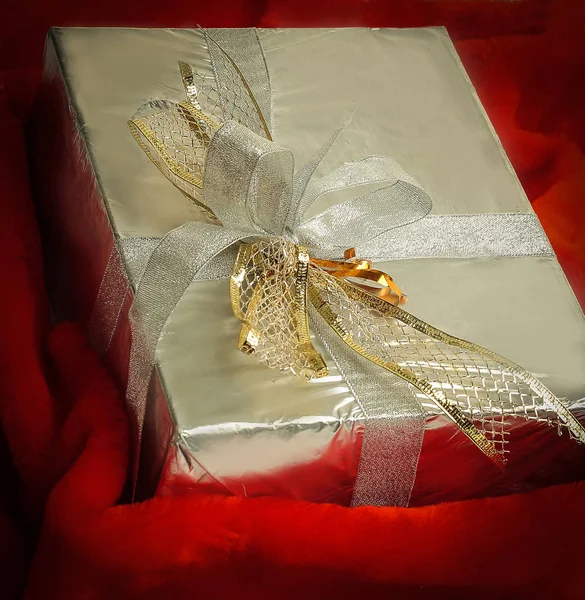 Closeup.boxes with gifts with gold ribbon — Stock Photo, Image