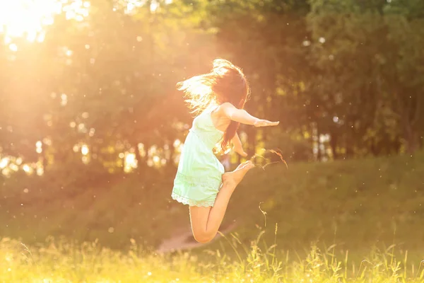 Happy girl in the rays — Stock Photo, Image