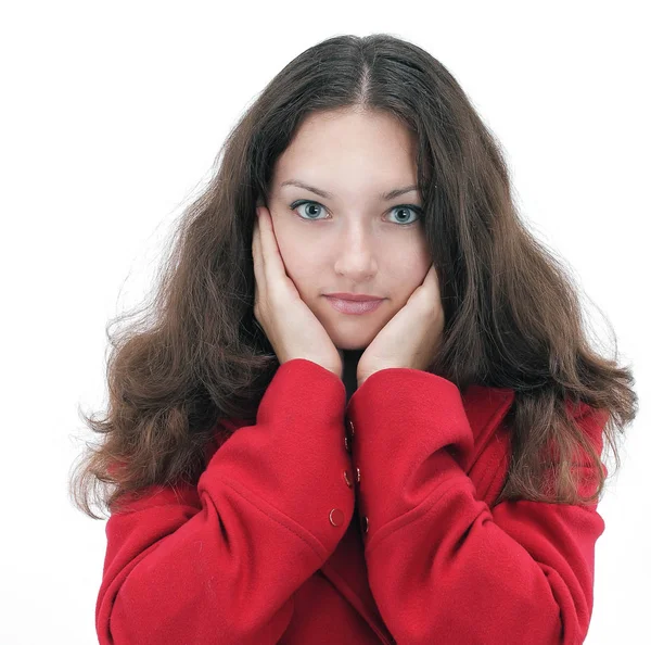 Überraschte junge Frau im roten Mantel — Stockfoto