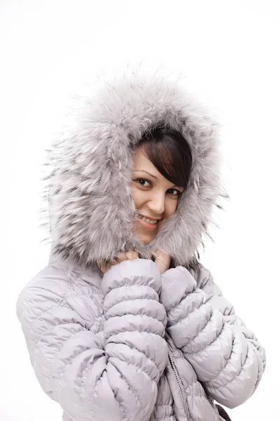 Portrait of beautiful young woman in a jacket with a hood. — Stock Photo, Image