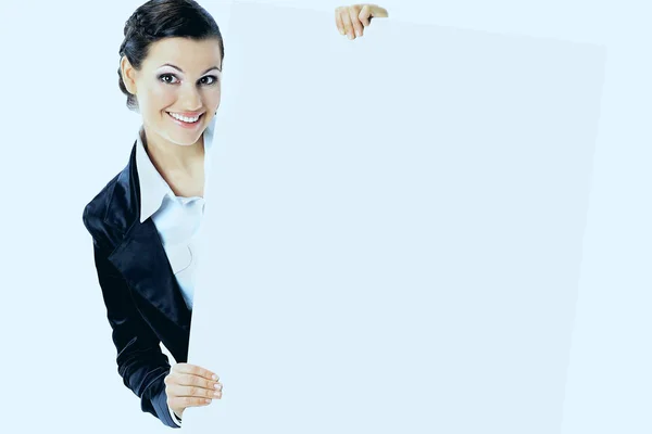Beautiful business woman with a white banner. — Stock Photo, Image