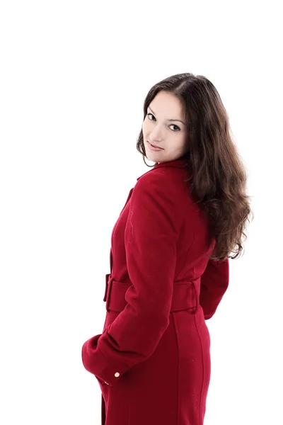 Όμορφη νεαρή γυναίκα σε ένα κόκκινο παλτό .isolated σε λευκό — Φωτογραφία Αρχείου
