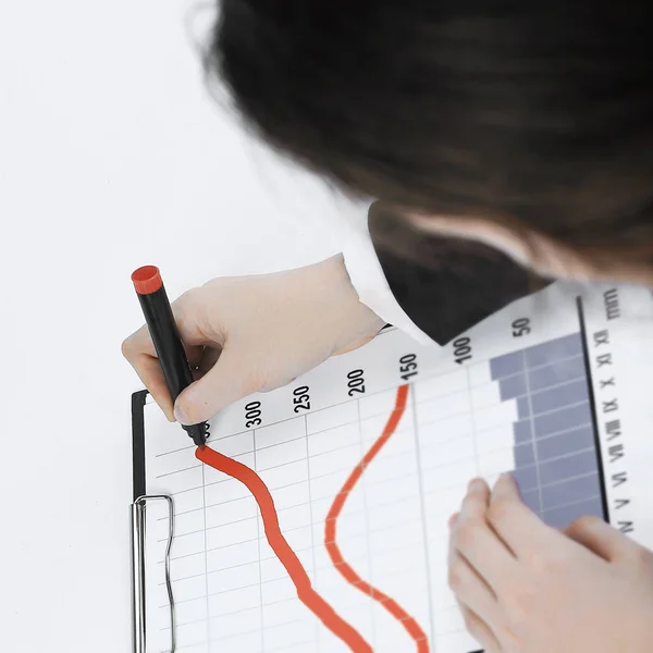 Close-up. business woman making a marketing schedule — Stock Photo, Image