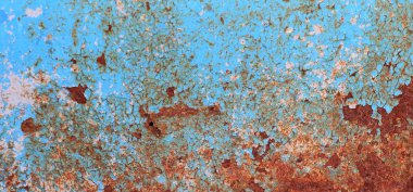 Duvardaki pürüzsüz dokudaki boyayı soyuyordum. Kırsal mavi grunge maddesi deseni