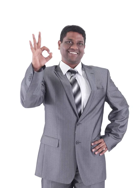 Guapo hombre de negocios mostrando OK gesture.isolated en un blanco — Foto de Stock