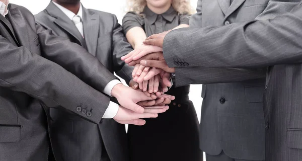 Pessoas de negócios mostrando unidade com as mãos juntas — Fotografia de Stock