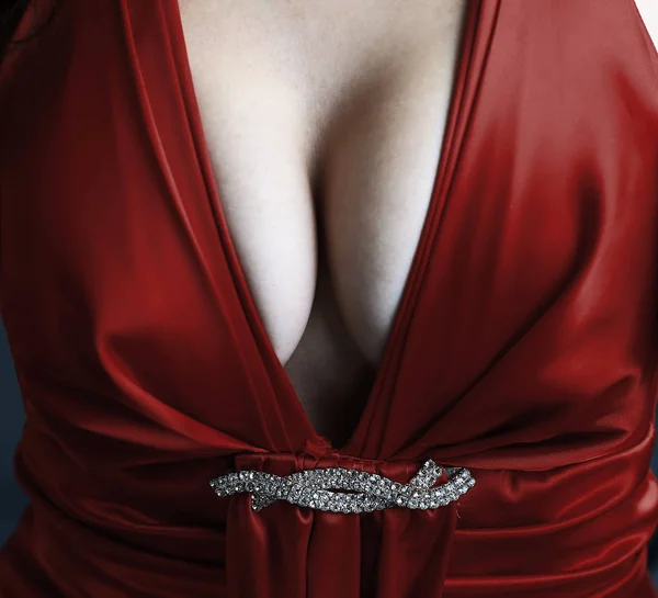 Breast of the model in evening dress — Stock Photo, Image