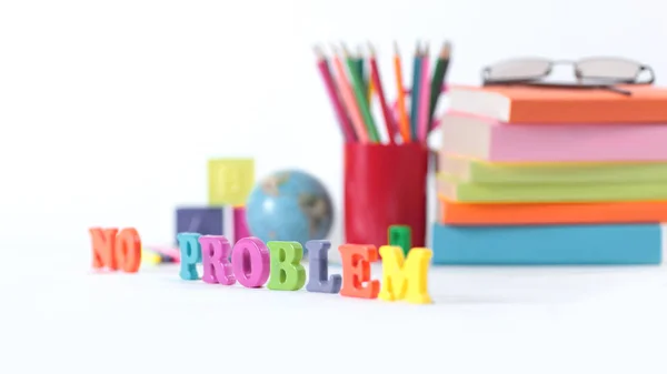 Words - no problem-on a blurred background of school supplies — Stock Photo, Image