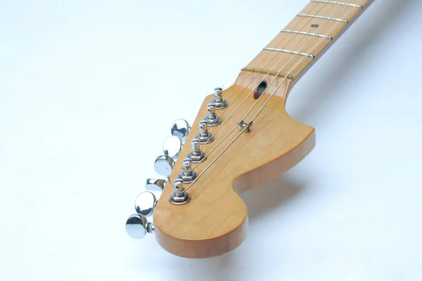 The neck of the guitar on white background — Stock Photo, Image