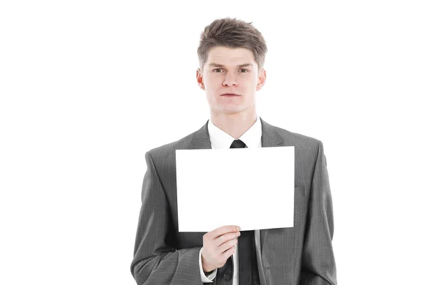 Giovane uomo d'affari che mostra un foglio bianco.isolato su un bianco — Foto Stock