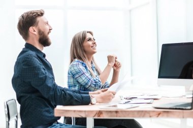 satisfied employees giving each other a high five