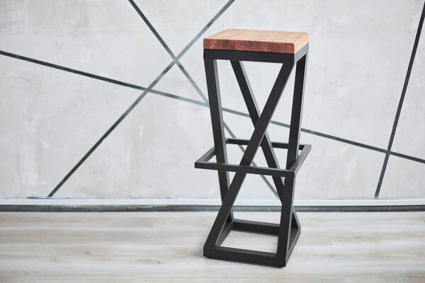 stylish bar chair made of wood and metal.