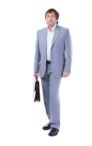 In full growth. confident businessman with leather briefcase — Stock Photo, Image