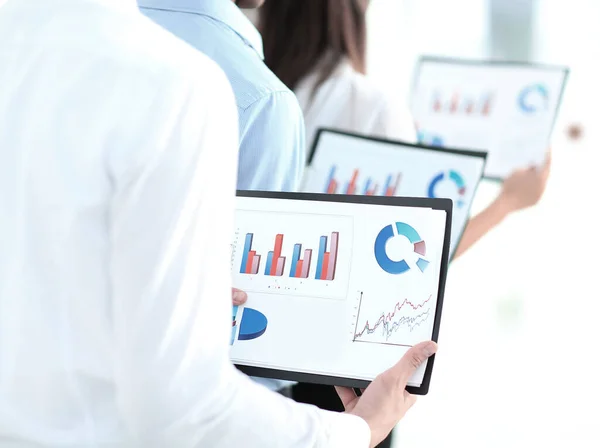 Closeup.business team keeps files of financial graphs — Stock Photo, Image