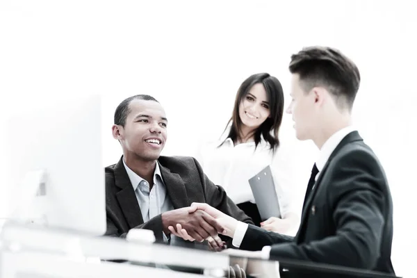 Handshake of business partners sitting at a table Desk — Stock Photo, Image