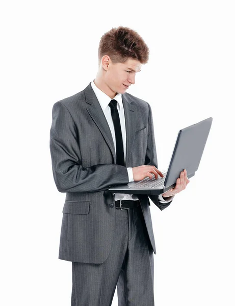 Confident young businessman with a laptop .isolated on a white — Stock Photo, Image