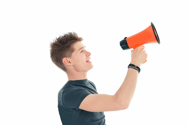 Closeup.modern young man with a megaphone. isolated on a white background. — Stock Photo, Image