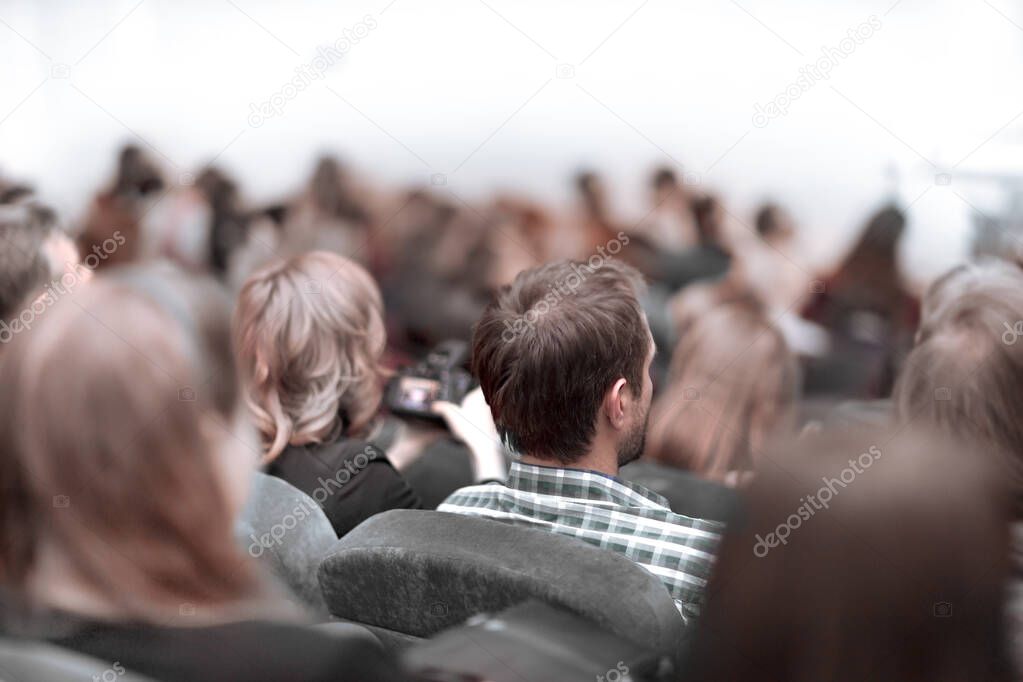 rear view. the audience sitting in the conference hall