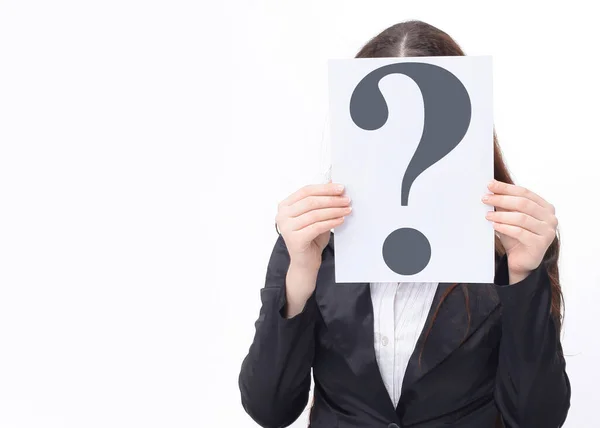 Young business woman covering her face with a question mark. — Stock Photo, Image