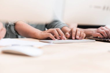 close up. businesswoman takes the text on a computer keyboard.