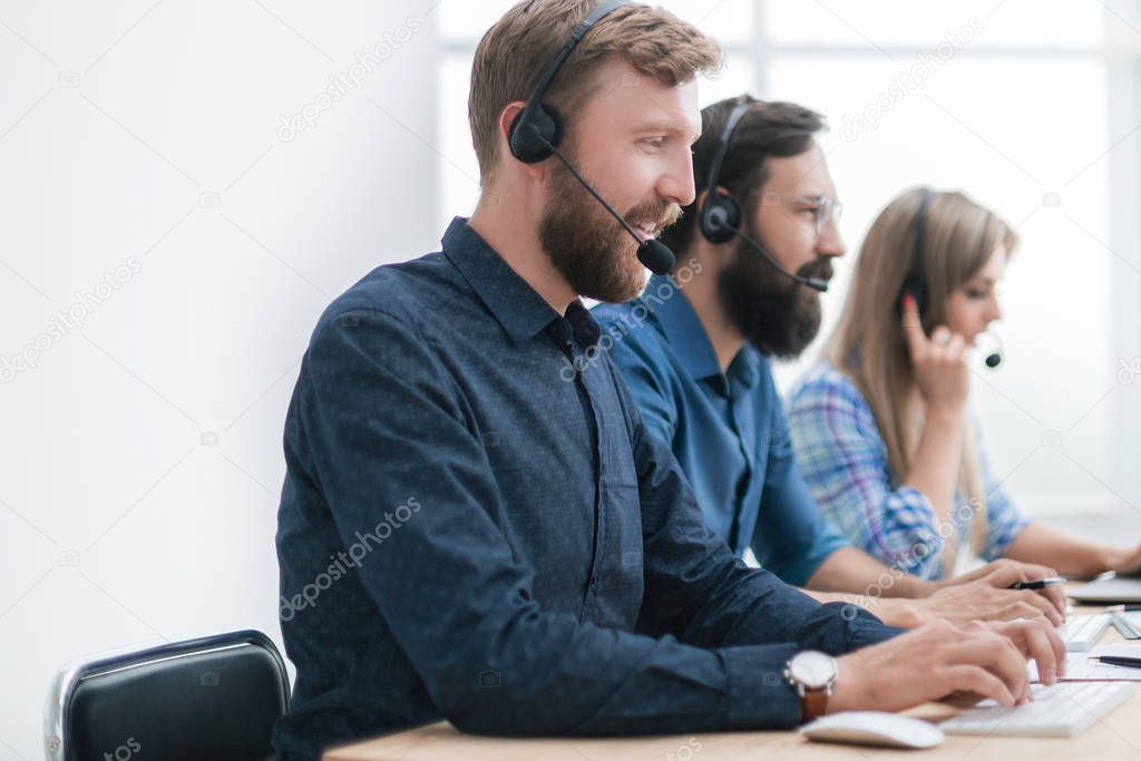 group of business center consultants working in the call center