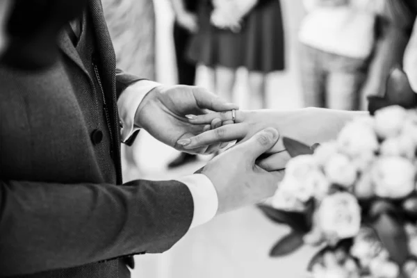 Close up. bride and groom exchanging their wedding rings. — 스톡 사진