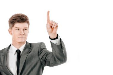 yakışıklı işadamı fark iz gösteriliyor. beyaz bir arka plan üzerinde izole