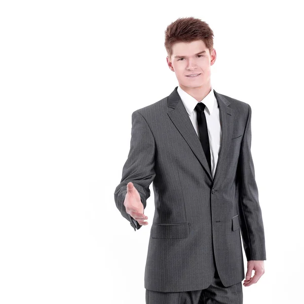 Businessman holds out his hand for a handshake. — Stock Photo, Image