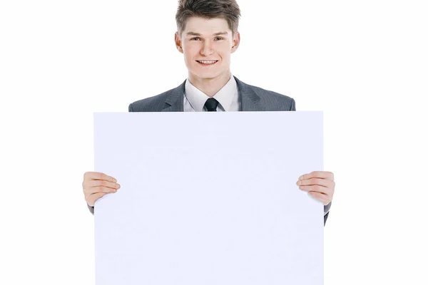 Joven empresario exitoso con banner en blanco.aislado en un blanco — Foto de Stock