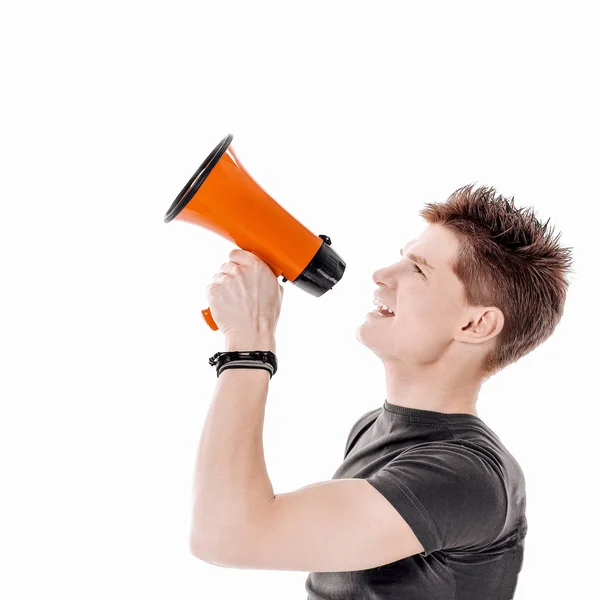 Closeup.modern young man with a megaphone. isolated on a white background. — Stock Photo, Image