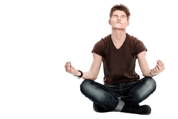 現代の男は、床に座って瞑想します。 — ストック写真