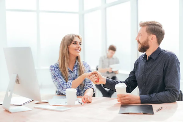 Young employees with coffee glasses sitting at the Desk — 스톡 사진