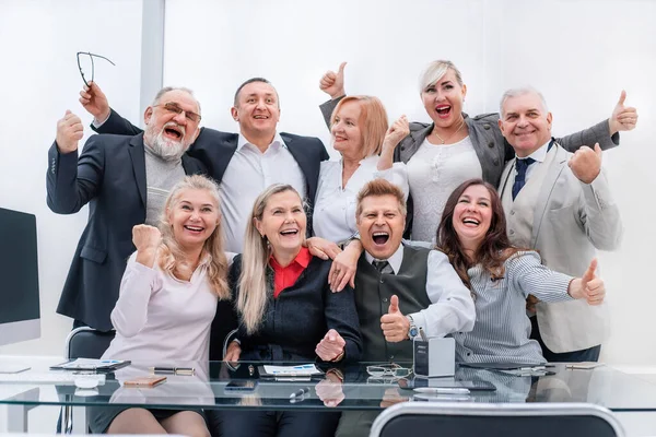 Happy group of professional professionals showing thumbs up. — Stock Photo, Image