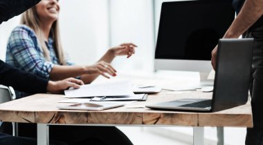 satisfied employees giving each other a high five