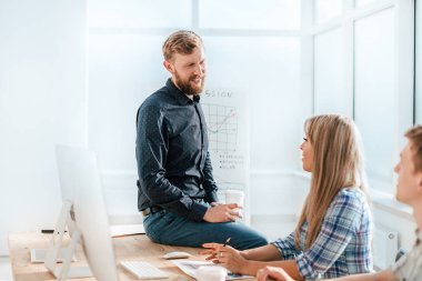 employees discussing the concept of a new startup.