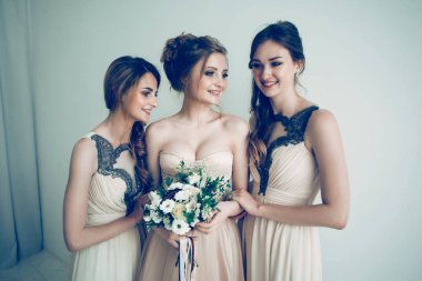 close up. happy bride with two girlfriends .