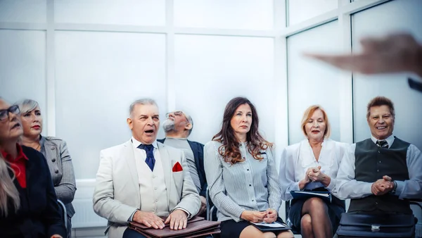 group of responsible business people sitting in the conference room.