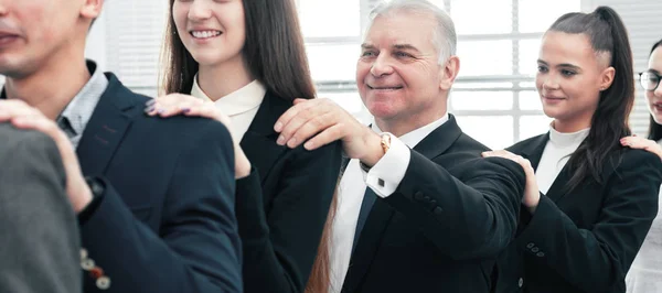 Group of corporate employees standing behind each other. — Stockfoto