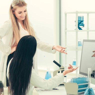 young scientists are testing a vaccine against coronavirus.