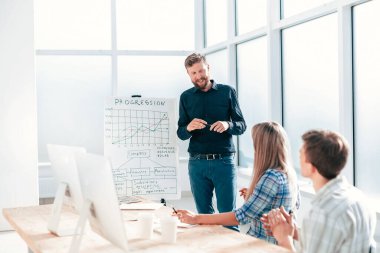 project Manager explaining to employees the new strategy of the company