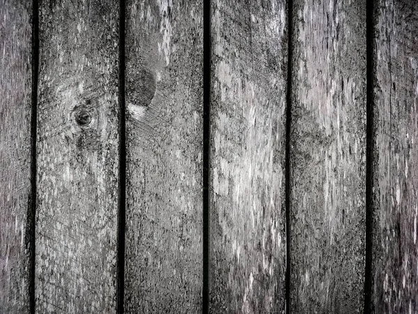 Close up. a fragment of a wooden fence. — Stock Photo, Image