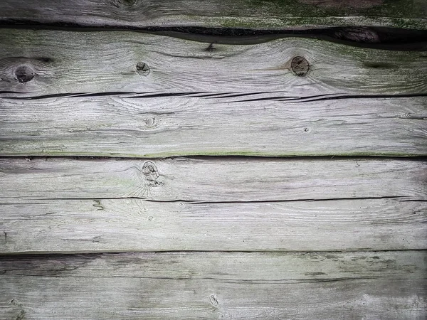 Fecha. um fragmento da parede de um celeiro de madeira — Fotografia de Stock