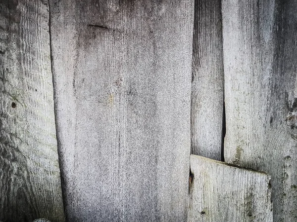 De cerca. un fragmento de la pared de un granero de madera — Foto de Stock