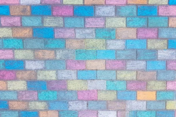 Doe dicht. fragment van de muur van gekleurde bakstenen. — Stockfoto