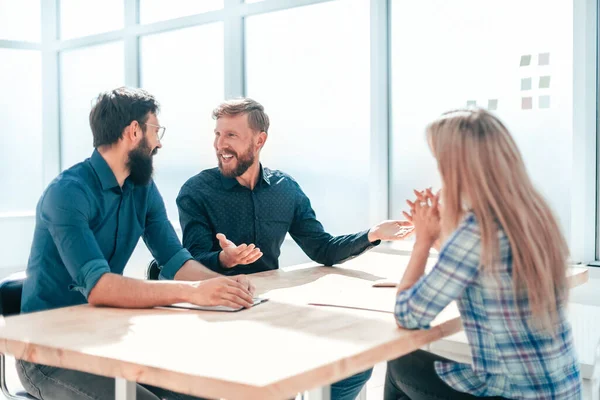 young woman sitting at interview in office.