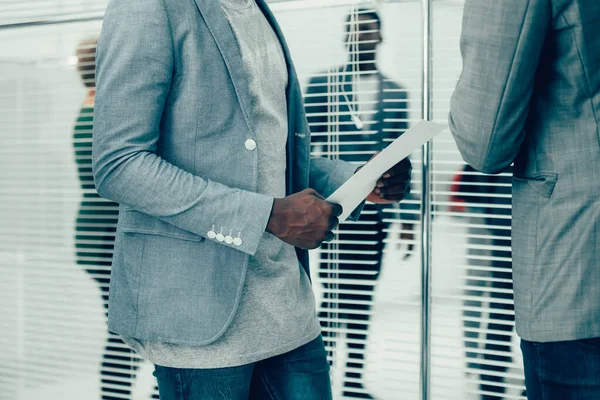 close up. office employees discussing a business document