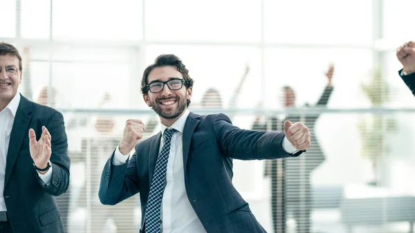 Group of successful employees is celebrating in the office. — Stock Photo, Image